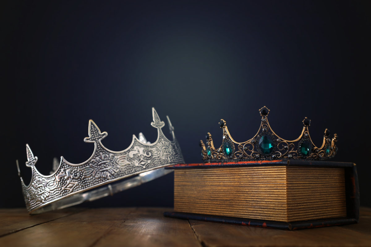 King and Queen Crown over Book